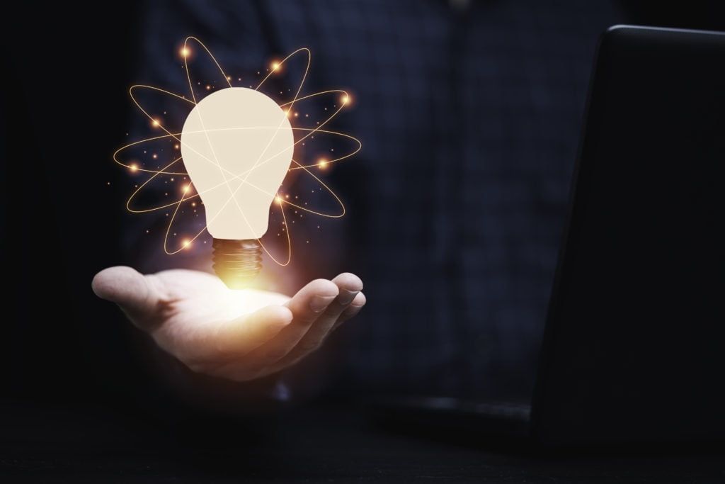businessman holding glowing lightbulb with connection line creative thinking ideas innovation concept